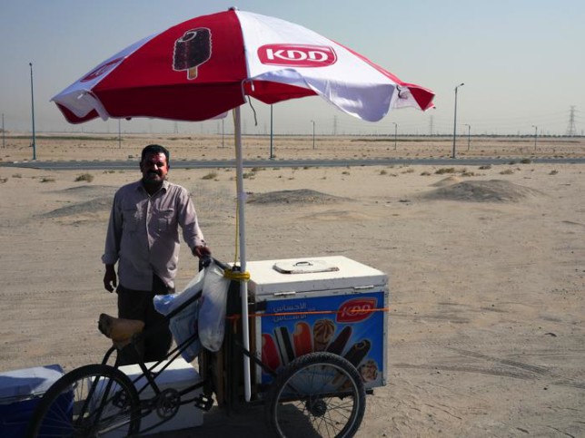 Tim on Mohammad Ice Cream:  “The Syrian ice cream guy.  He was riding 20 kilo a day back and forth and sitting out there in the hot sun in Khiran.  They pay rent on the cart, so who knows how much they are making.  Sometimes I ask sometimes I don’t.“
